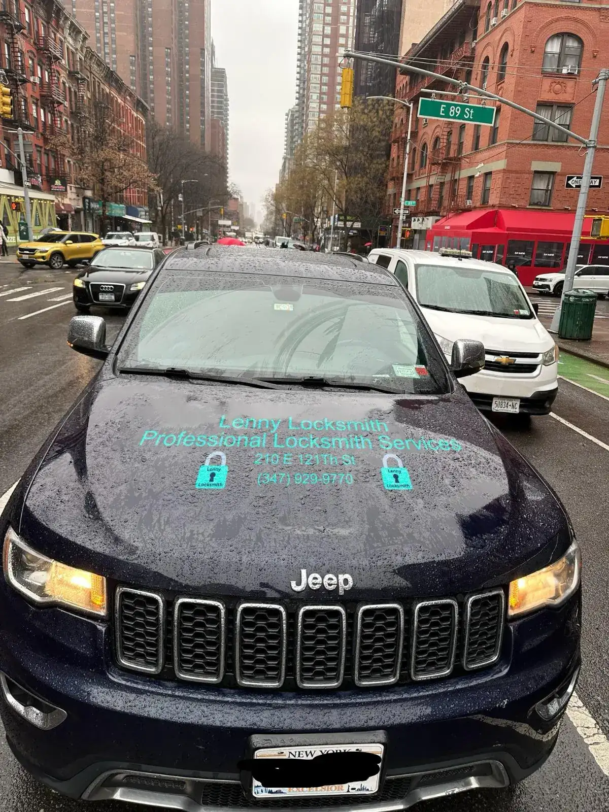 Lenny Locksmith mobile unit — Jeep Grand Cherokee front view on E 89th St